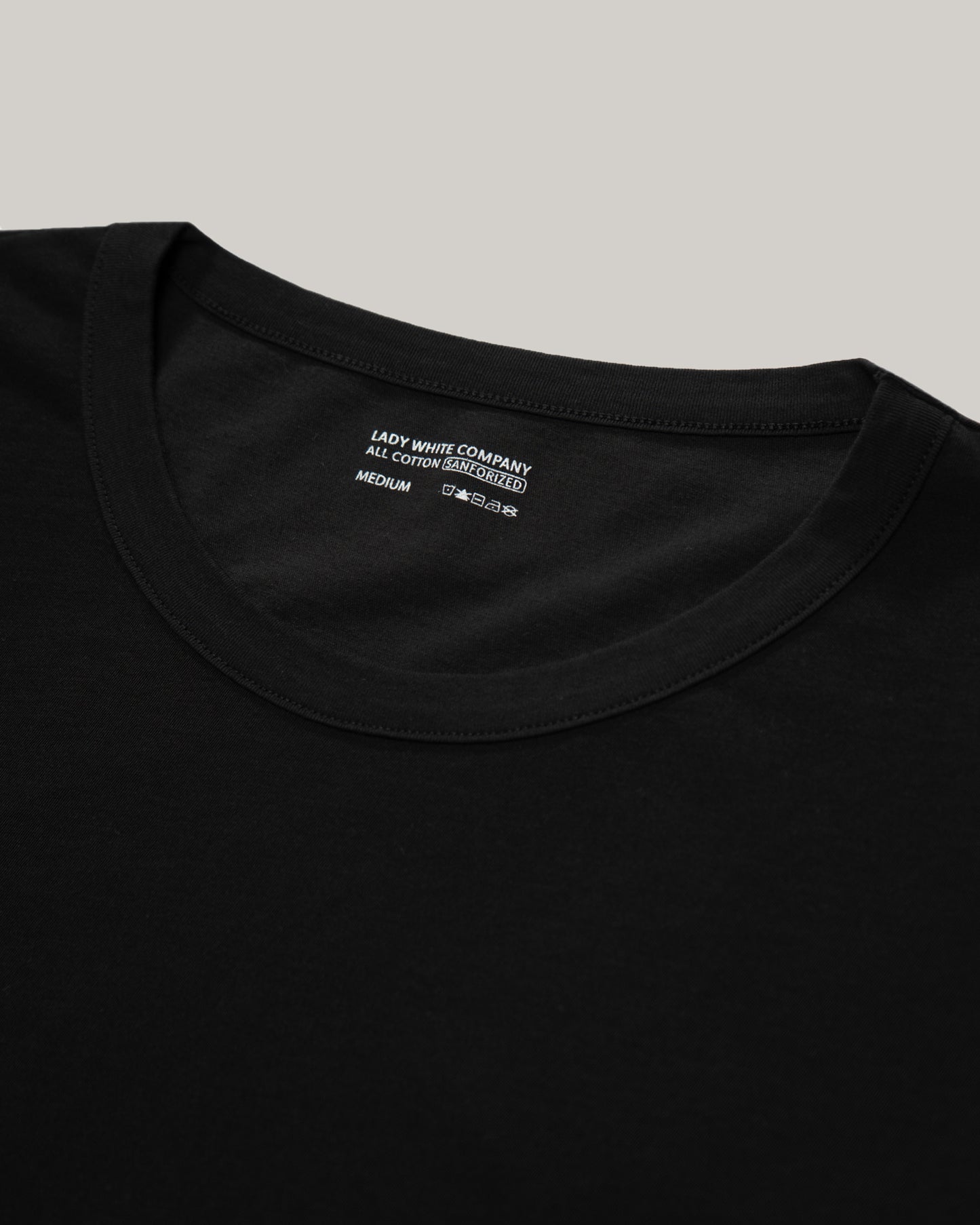 LADY WHITE CO. SLEEVELESS TEE - BLACK
