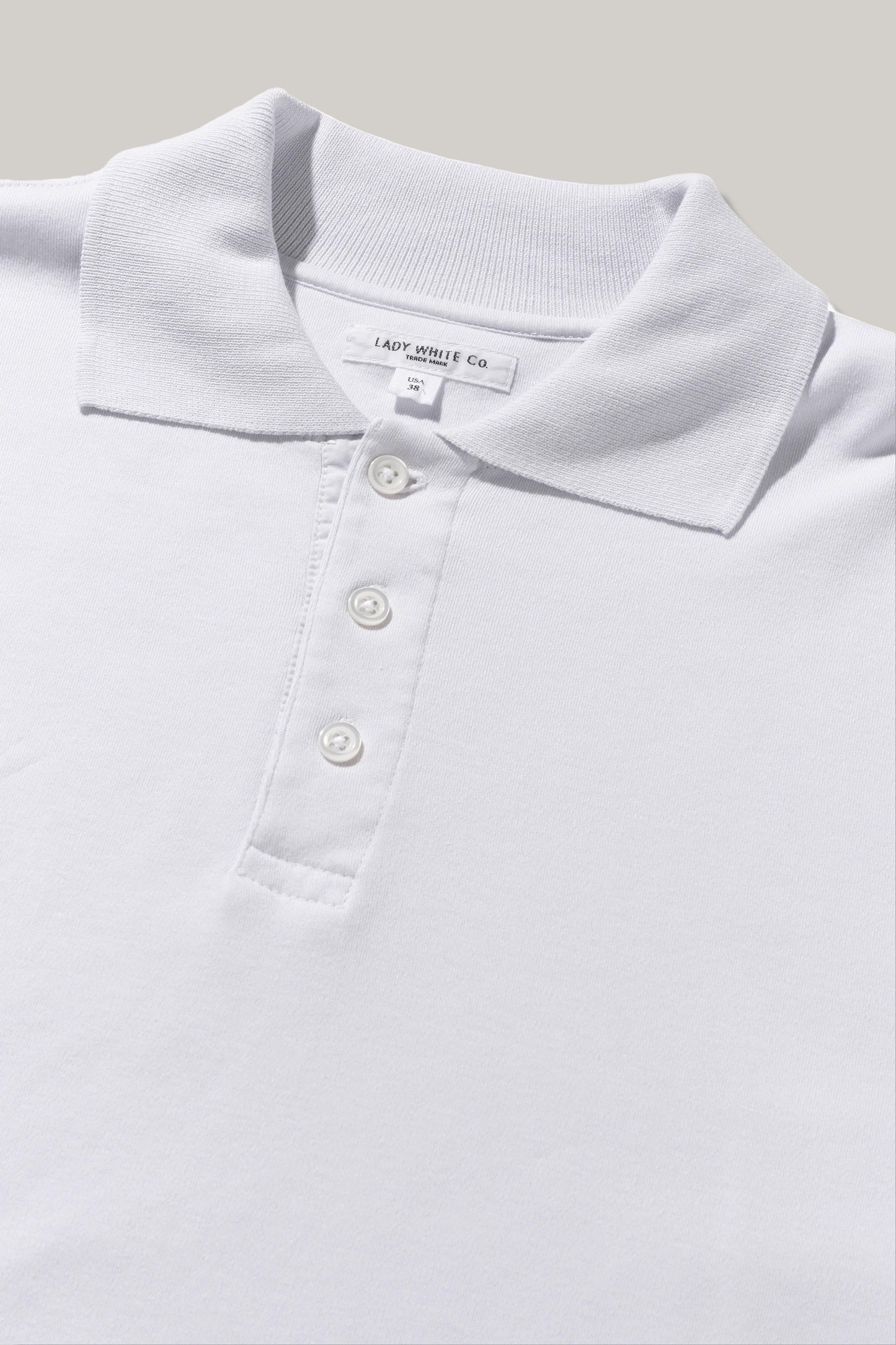 LADY WHITE CO. THREE BUTTON POLO - ICE