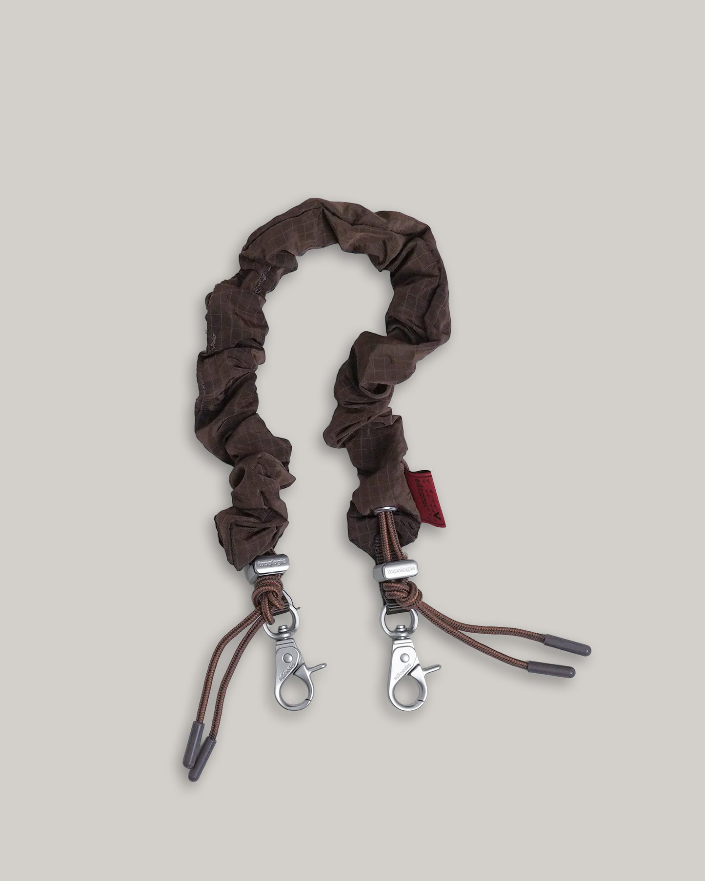 TOPOLOGIE BUNGEE WRIST STRAP COCOA