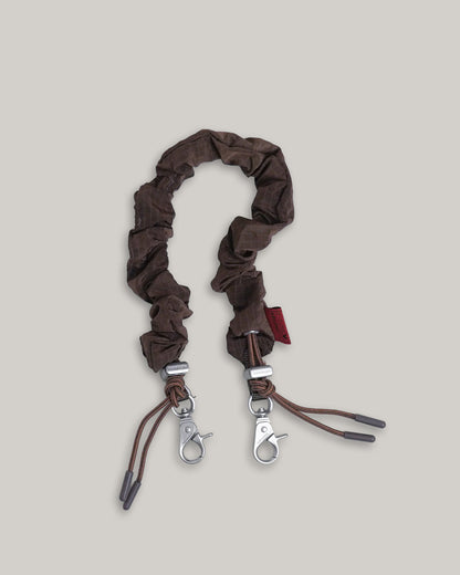 TOPOLOGIE BUNGEE WRIST STRAP COCOA