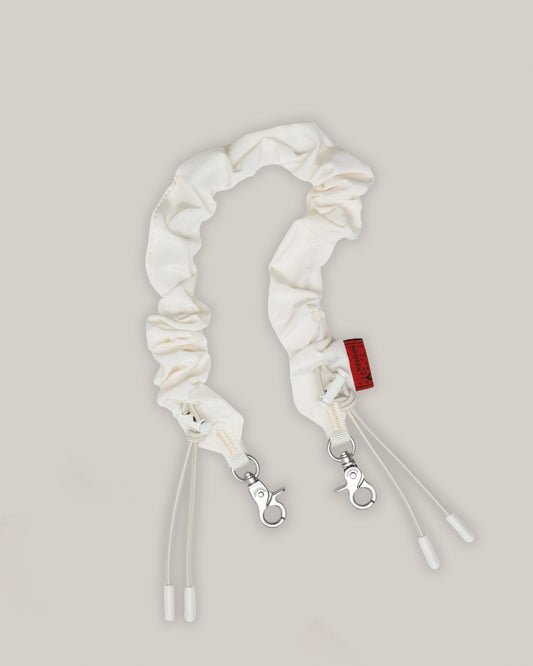 TOPOLOGIE BUNGEE WRIST STRAP OFF WHITE TECH SATEEN